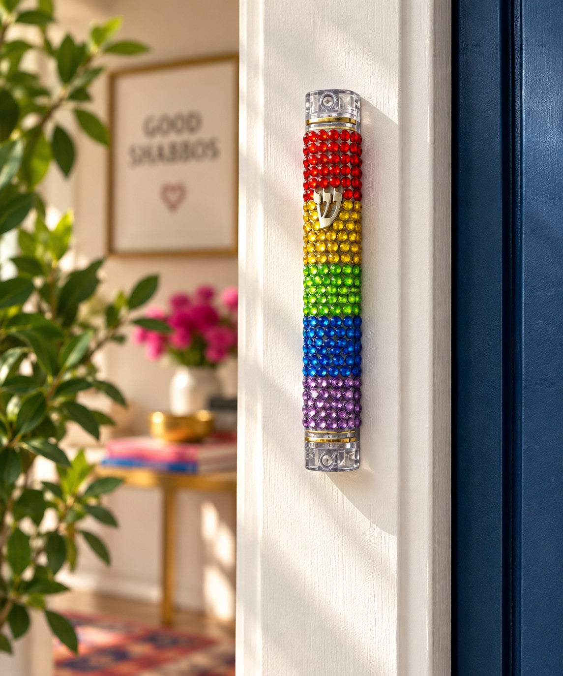 Rainbow rhinestone mezuzah on a doorpost
