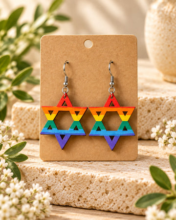 Rainbow Star of David wood earrings on a kraft card