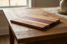 Shabbat Shalom challah board, striped exotic hardwood etched with Hebrew and Jewish stars
