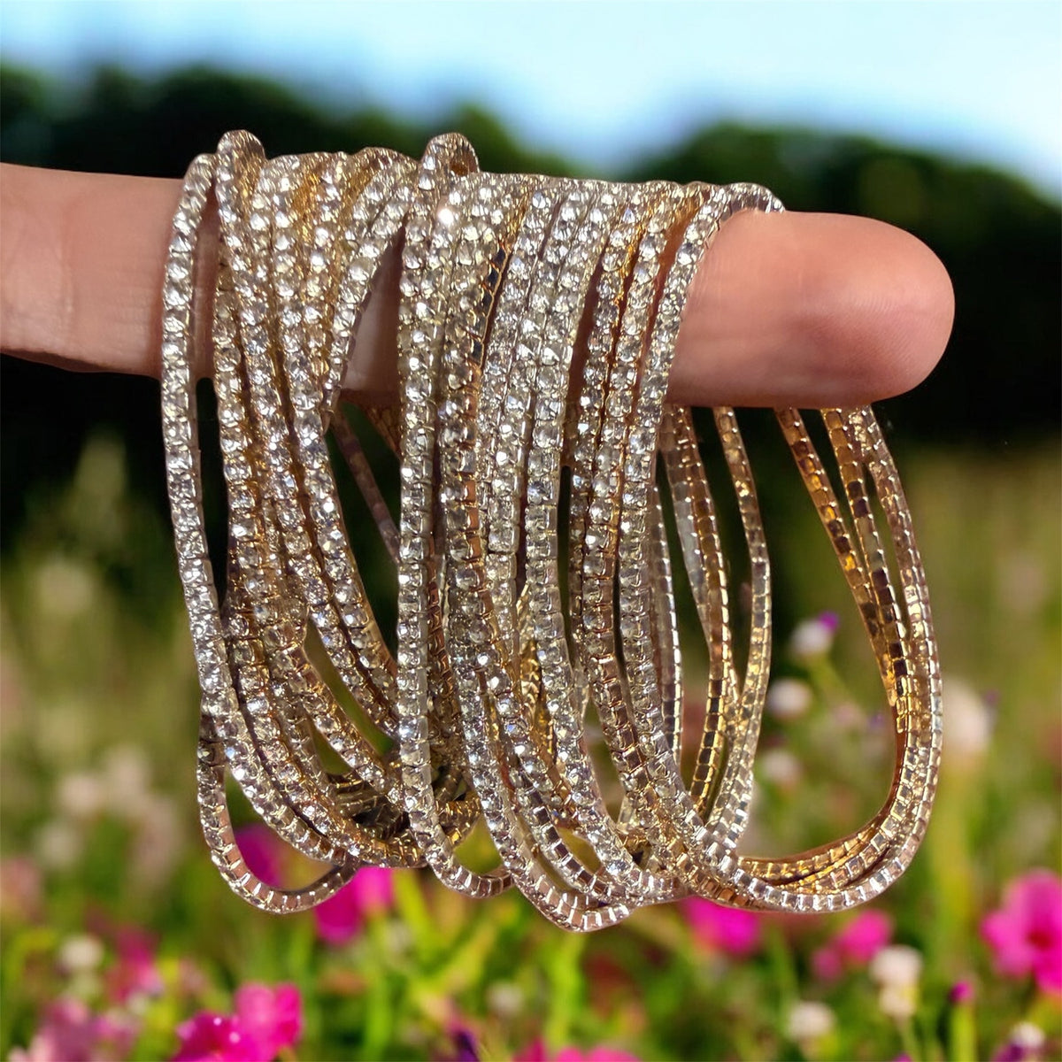 Shalom Peace Bracelet, gold sparkle bangles held on fingers