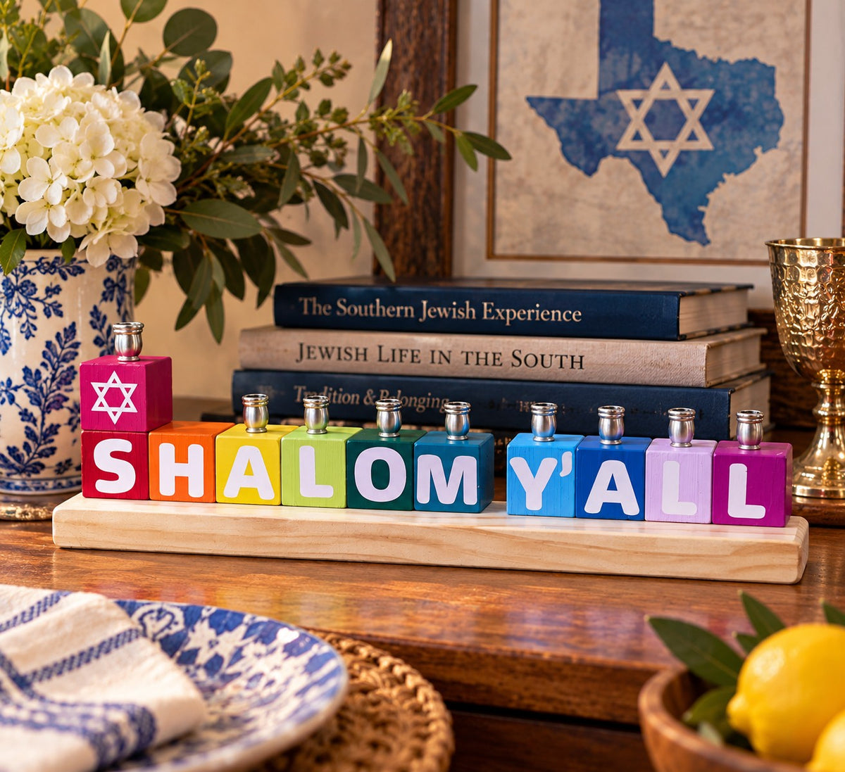 Shalom Y'all menorah on a festive table
