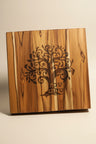 Teak challah board engraved with a tree of life