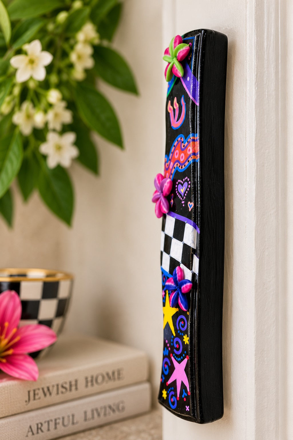 Zelda Hand-Painted Mezuzah Case, Zelda mezuzah on a doorpost
