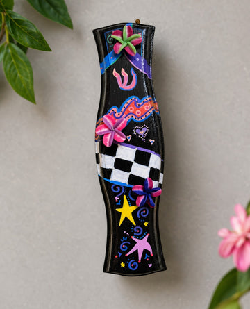Zelda Hand-Painted Mezuzah Case, black mezuzah painted with flowers, stars and checks
