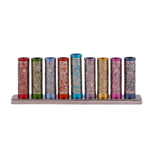 Emanuel menorah with nine multicolor anodized cylinders wrapped in lacy silver cutout on a low base