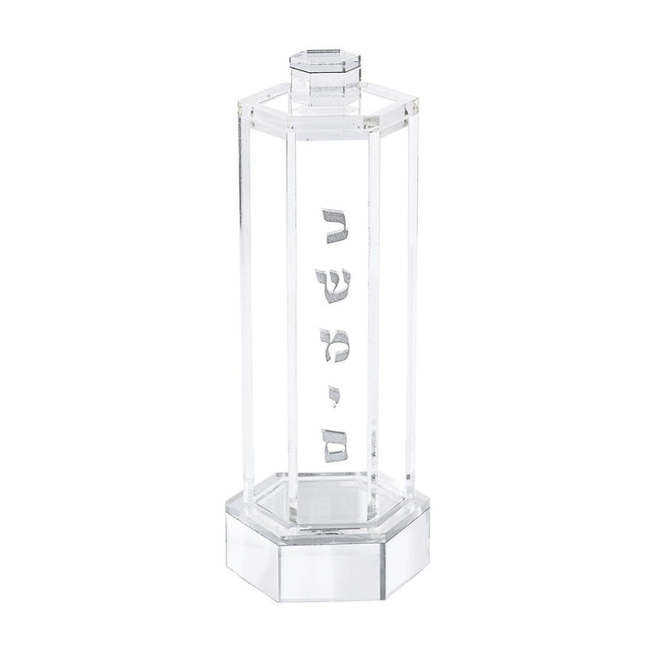 Clear hexagonal acrylic besamim holder with silver Hebrew lettering, shown empty