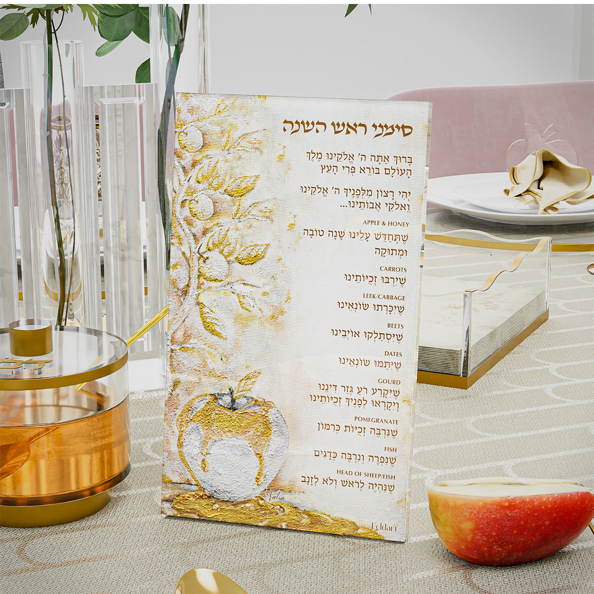 Close-up of the apple simanim card leaning by the honey dish, with a sliced apple on the table
