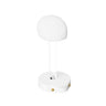 Wig head stand angled to show the clear column and the pull tab on the base compartment