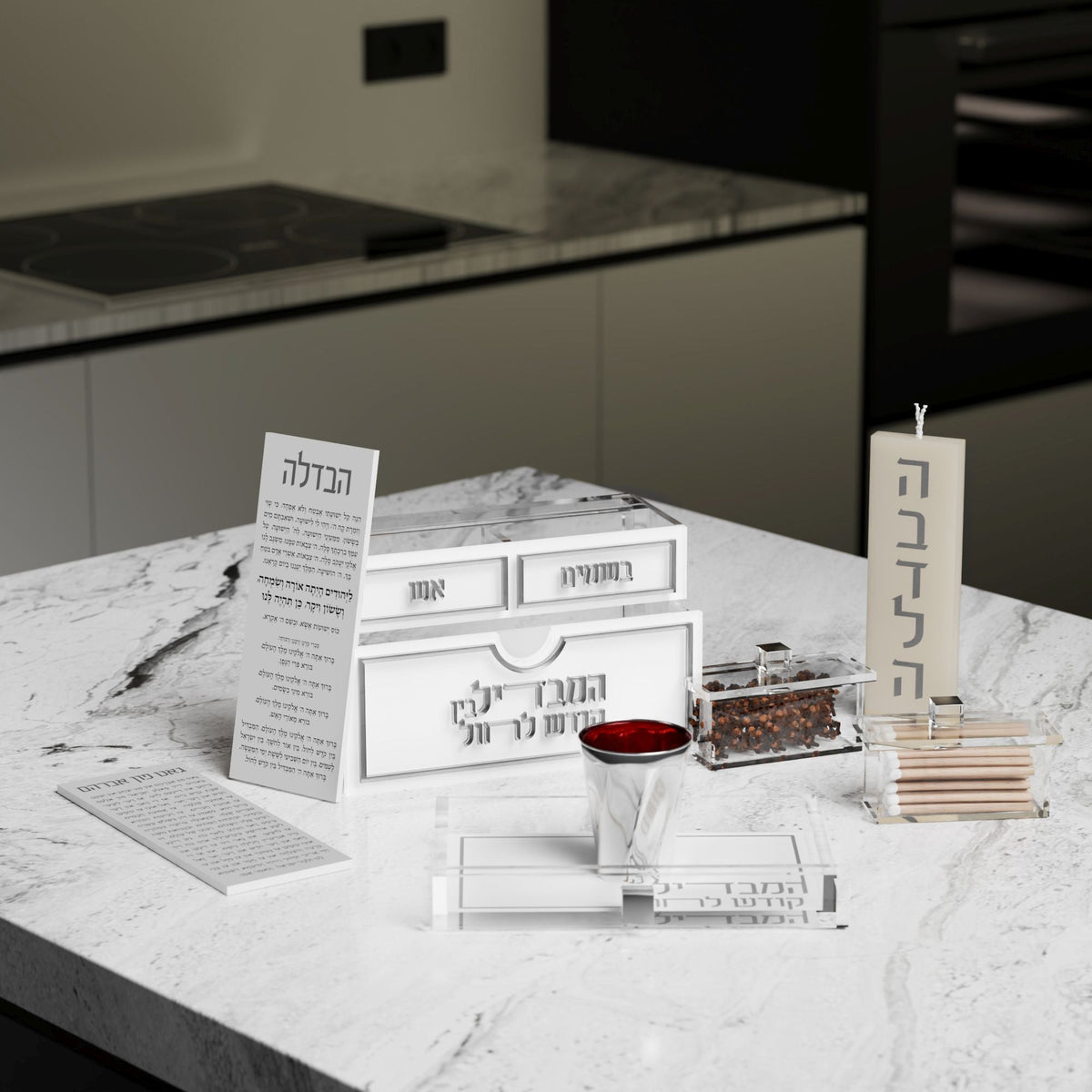 Silver set laid out on a kitchen counter with Havdalah card, candle, tray and besamim