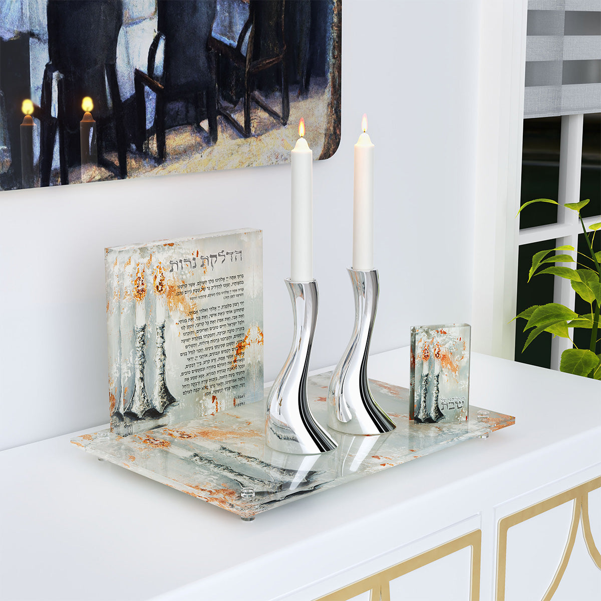 Divine Mist matchbox on a candle tray with candlesticks and a lettered block on a white sideboard