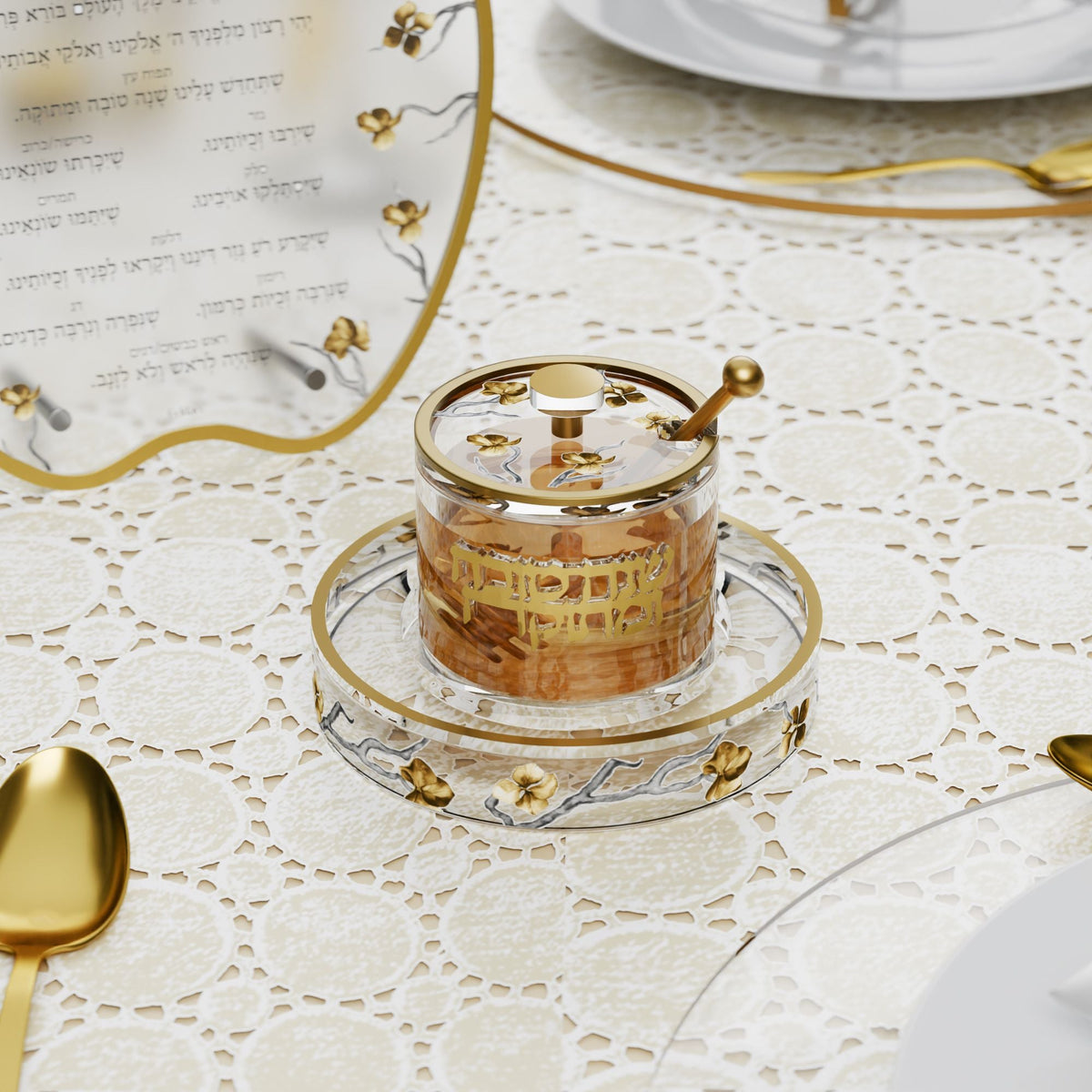 Honey dish filled with honey on a lace Rosh Hashanah table beside the apple-shaped simanim card