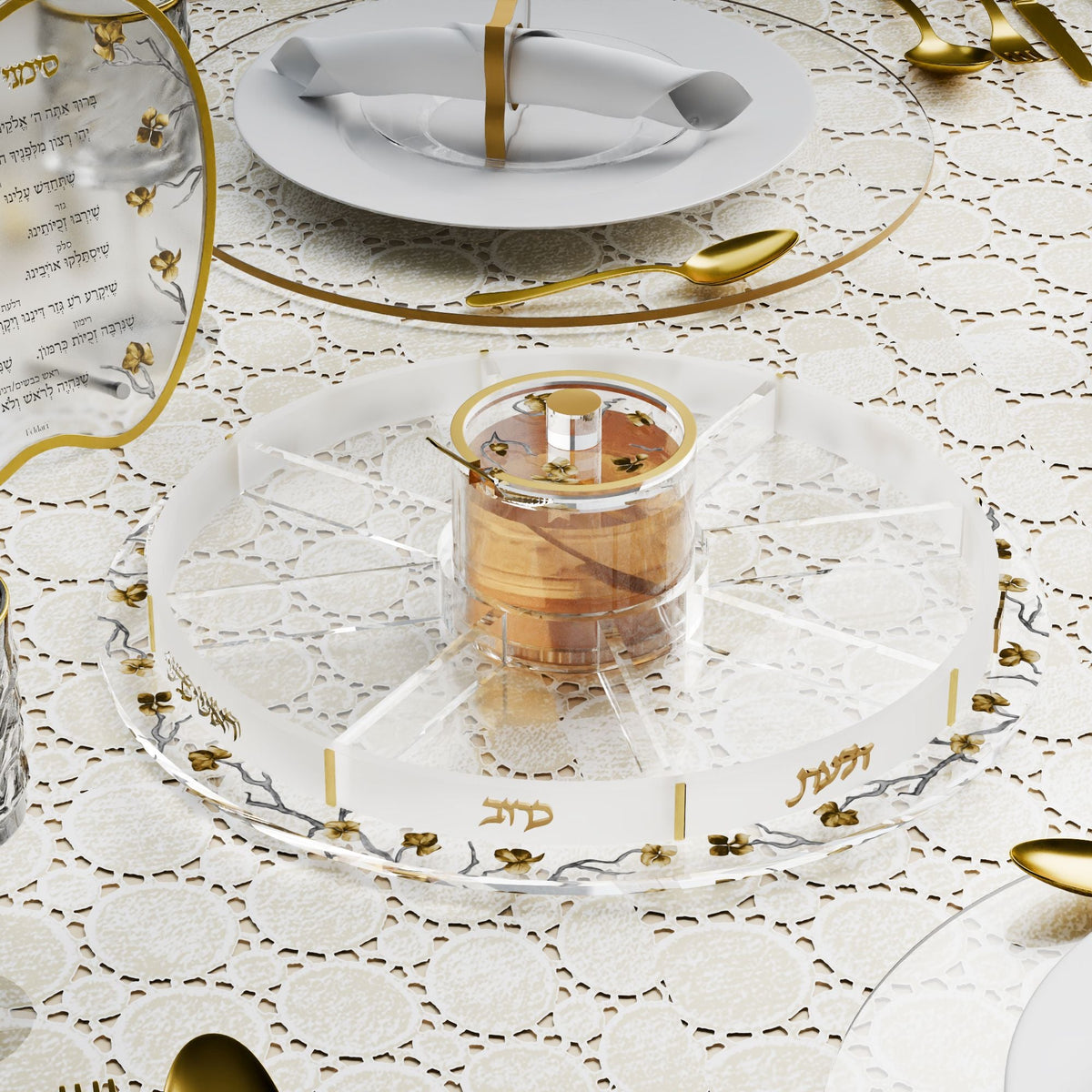 Empty simanim tray with honey in the center dish, showing raised Hebrew labels on the swivel base