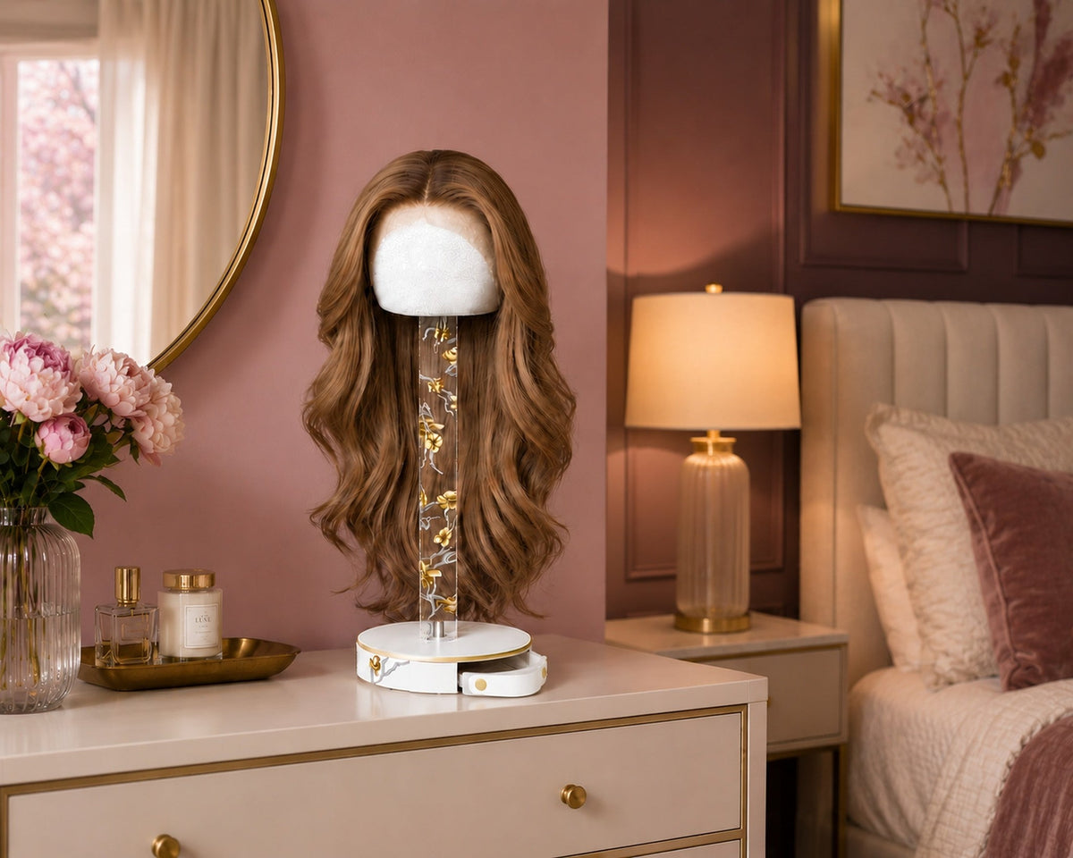 Golden branch wig head stand with wig on a vanity