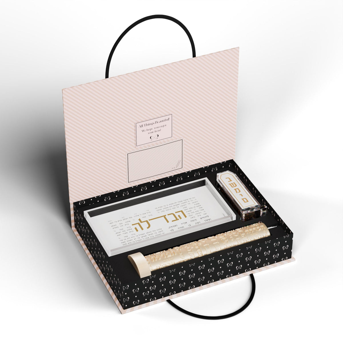 Open gift box holding the gold Havdalah tray, candle and besamim holder in fitted slots