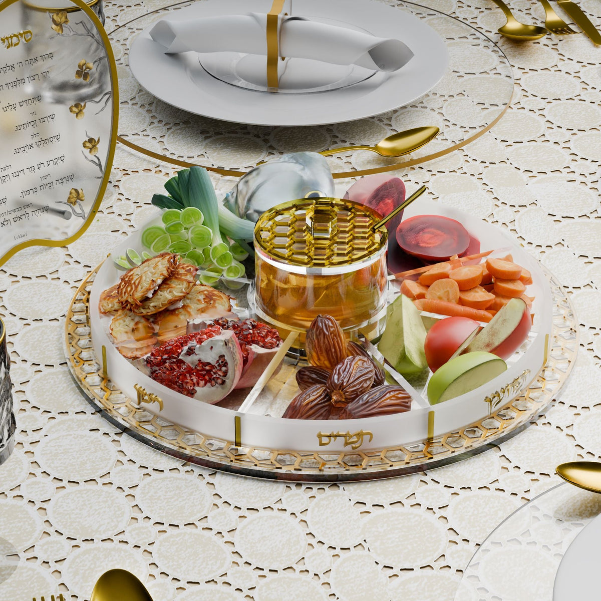 Gold tray filled with dates, pomegranate, carrots, apples, leeks and beets around the honey