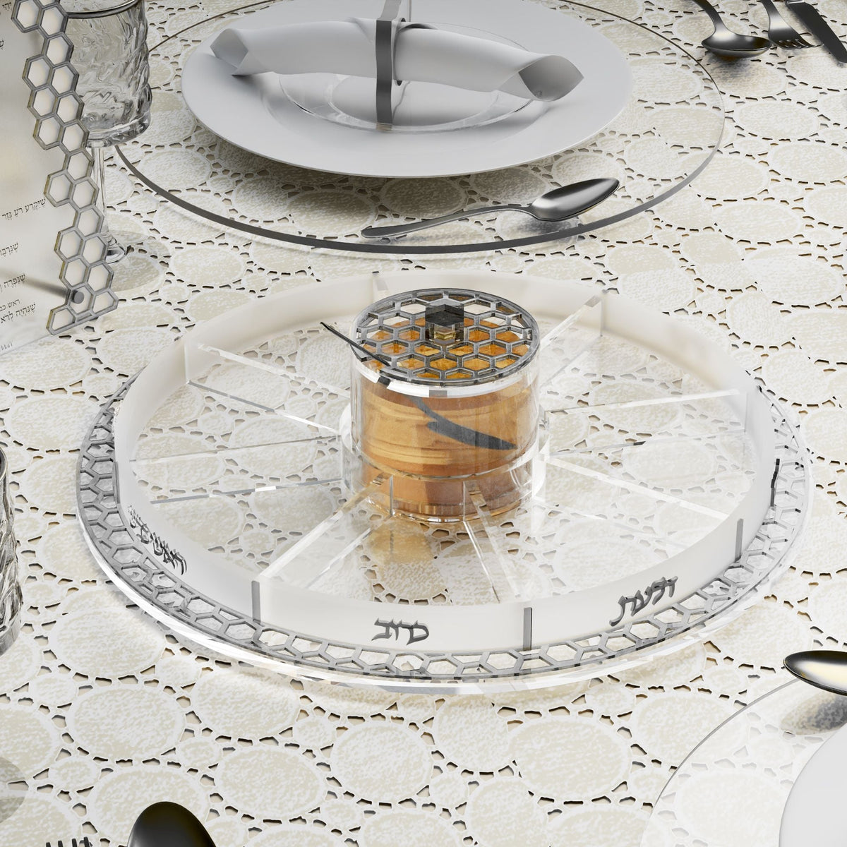 Silver honeycomb simanim tray with honey dish on a set Rosh Hashanah table