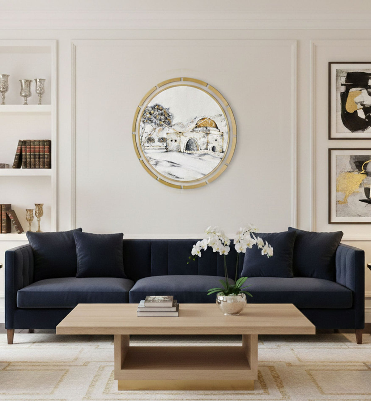 Clock hung above a navy sofa in a living room with bookshelves either side