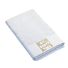 Gold lettering version of the netilas yadayim towel, folded on white