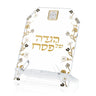 Ornate Garden clear Haggadah stand with small gold clock, gold Haggadah Shel Pesach lettering and flowering branches