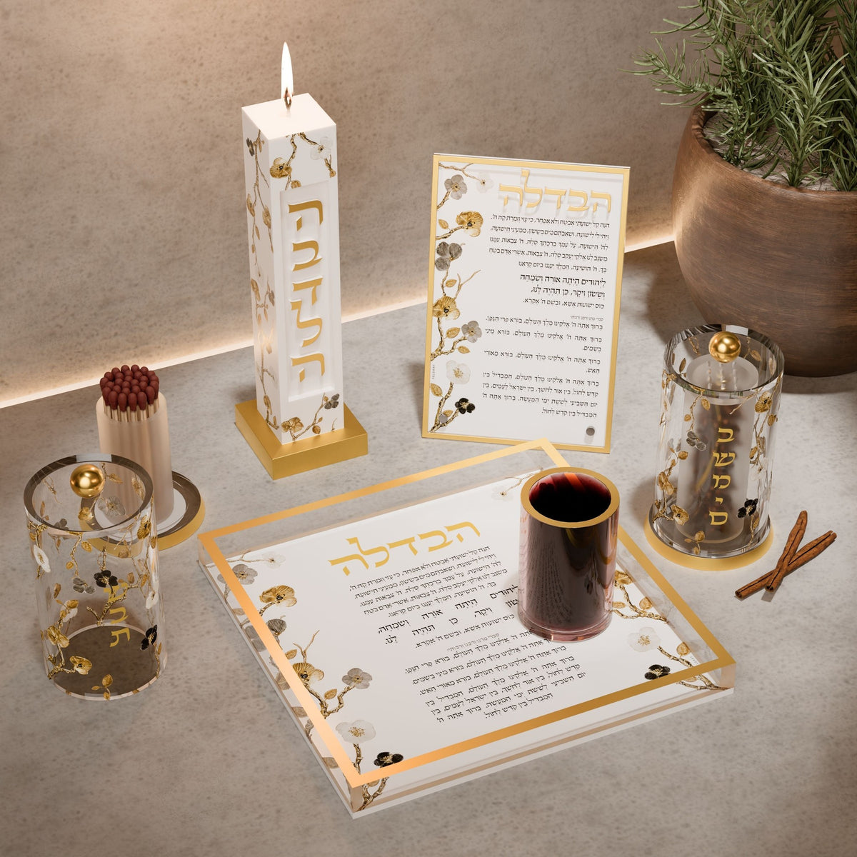 Havdalah card standing behind a matching tray with wine cup, lit candle and spice and match holders
