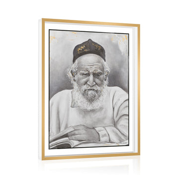 Framed portrait of Reb Moshe Feinstein in a kippah, reading an open sefer, gold and white frame