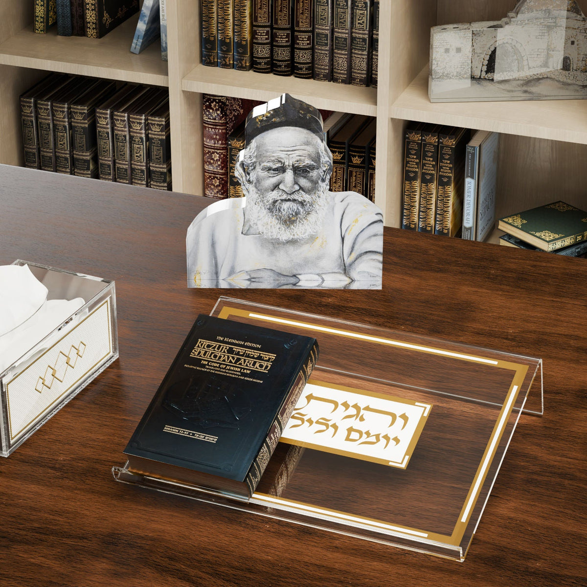 Reb Moshe block on a study desk behind a lucite shtender holding a Kitzur Shulchan Aruch