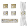 Four Serene Kosel napkin rings with gold Hebrew Shabbos lettering, one laid flat to show its clasp