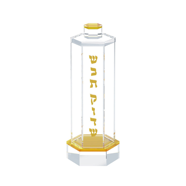 Gold version of the hexagonal match holder with gold lid and base, shown empty