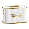 Signature edged towel box with gold edging and Towels script, rolled white towels inside