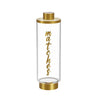 Signature raised match holder in gold, clear tube with vertical gold script matches lettering
