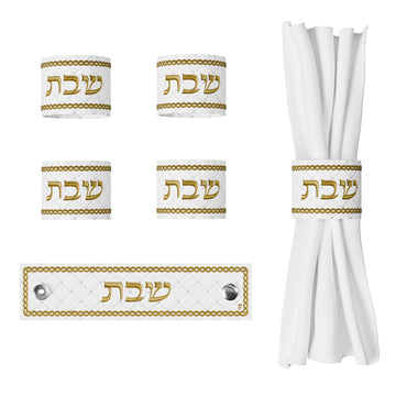 Four gold Woven Leather Shabbos napkin rings, one opened flat with clasps, one around a napkin