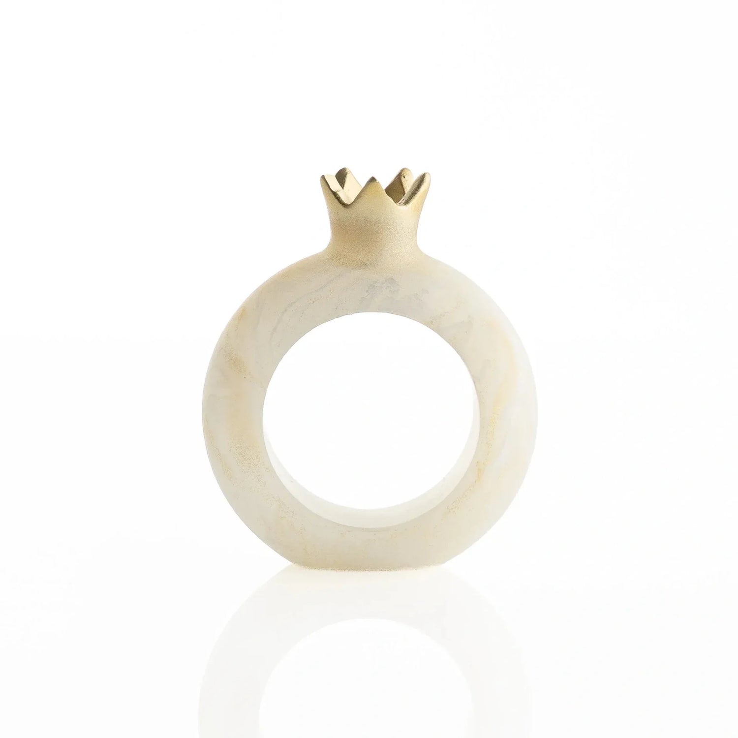 Single cream-and-gold resin pomegranate napkin ring on a white background