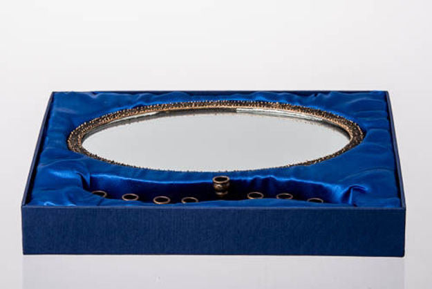 Golden Links menorah on a mirror tray, view 2