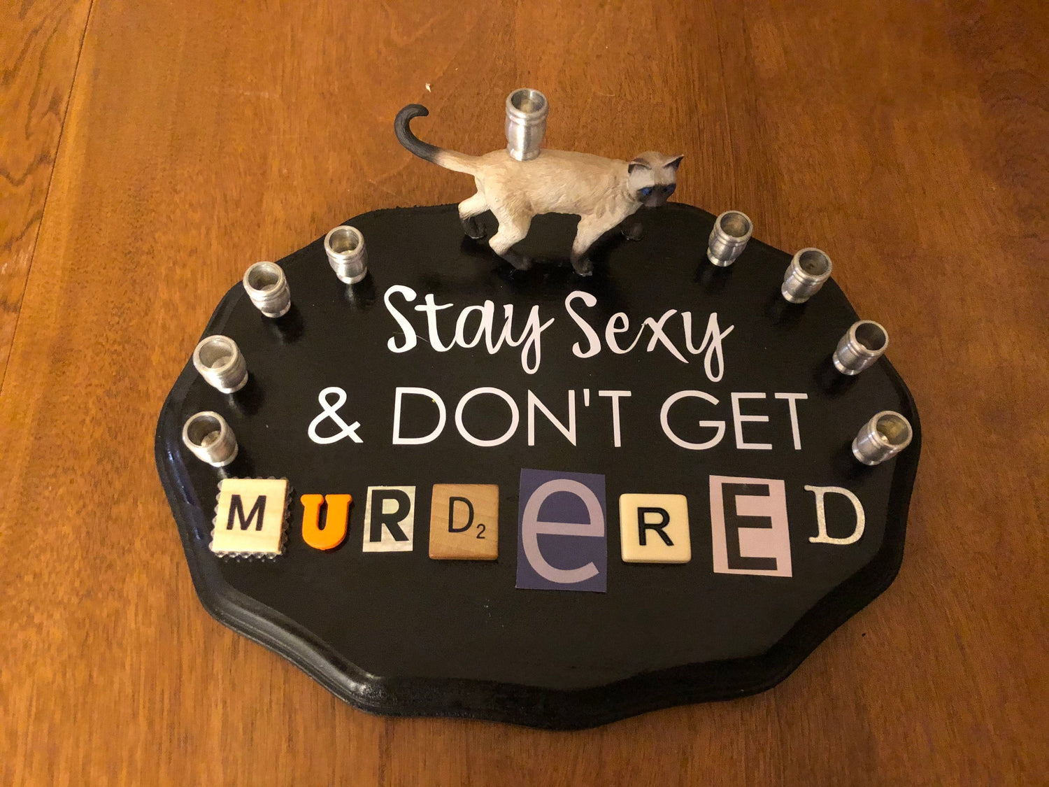 My Favorite Murder podcast menorah — collage plaque with cat shamash and aluminum cups | Judaica Square Lakewood (view 2)