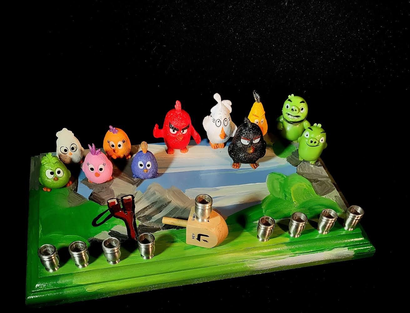 Angry Birds menorah — red and yellow bird figures on painted wood plaque | Judaica Square Lakewood (view 3)