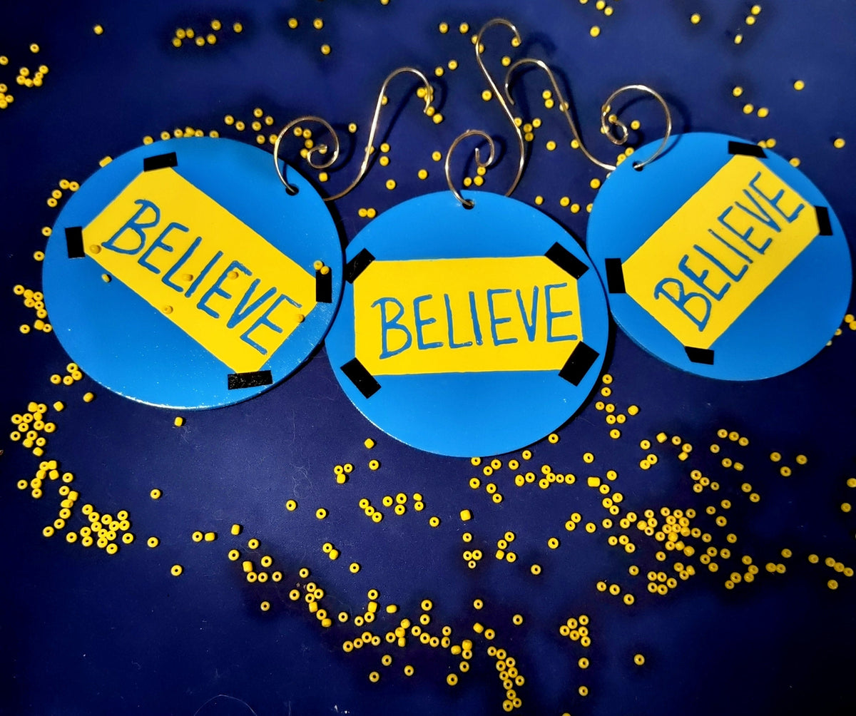 Believe ornament — Ted Lasso wood circle with vinyl lettering and gold spiral hook | Judaica Square Lakewood (view 3)