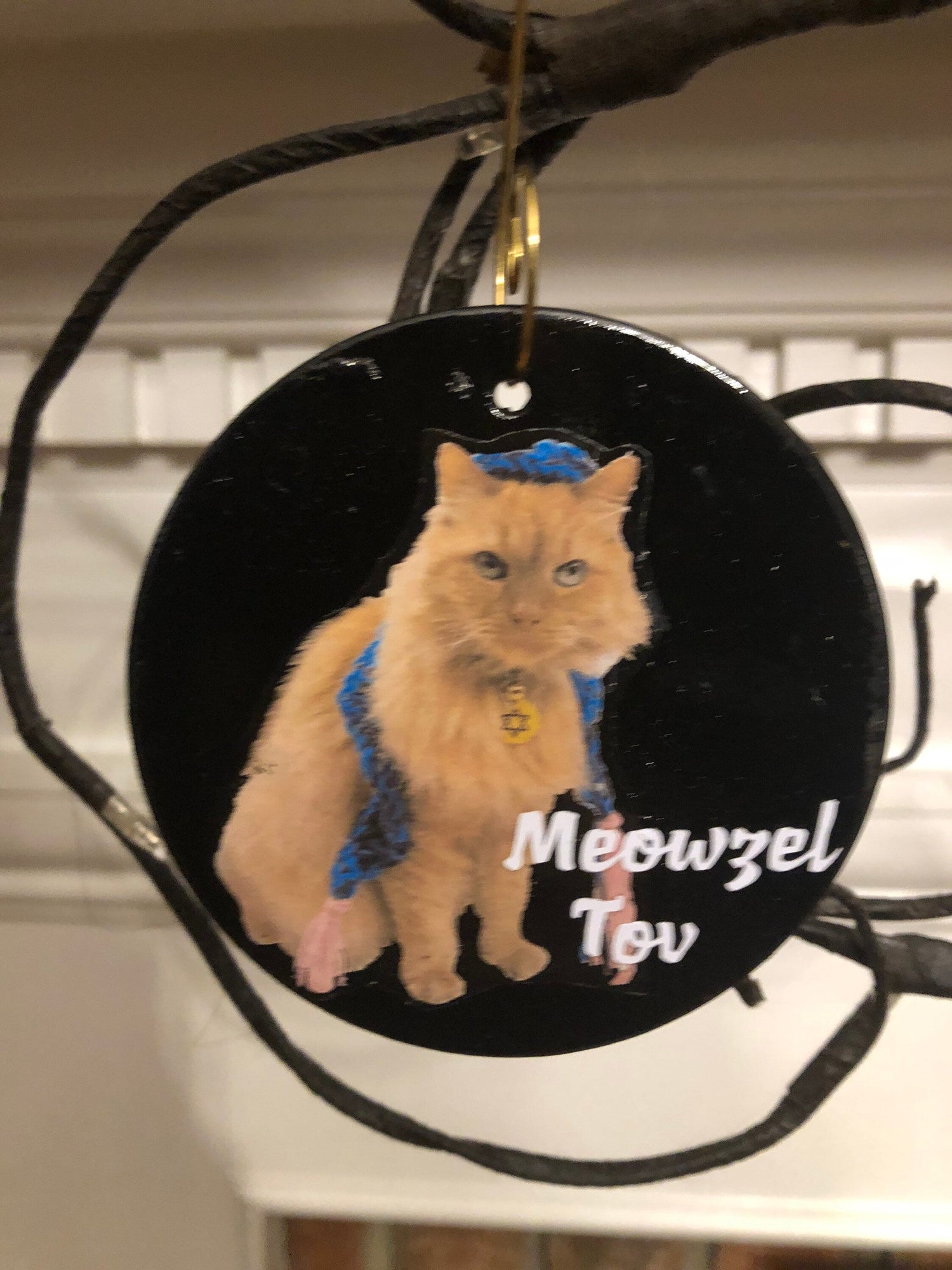 Wooden cat portrait ornament reading Meowzel Tov with wire hanger | Judaica Square Lakewood (view 3)