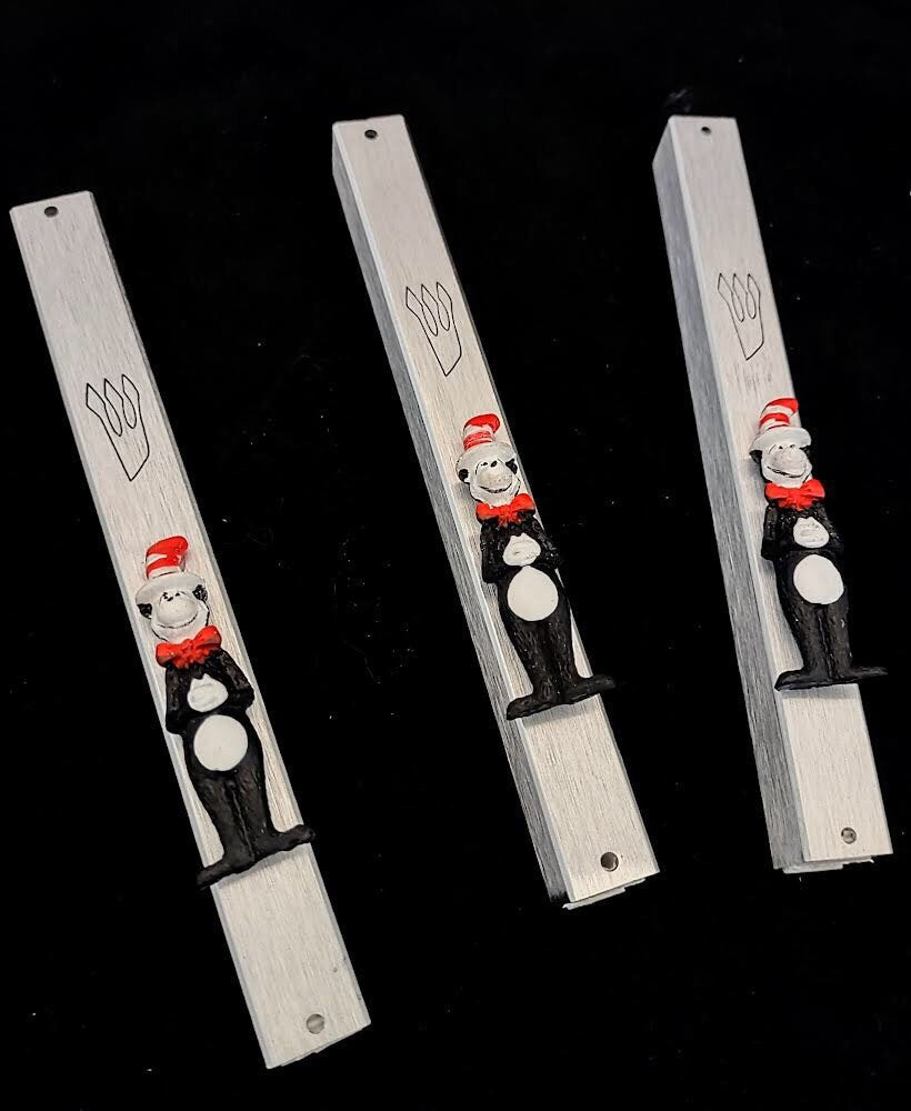 Cat in the Hat mezuzah case — silver frame with repurposed Dr. Seuss figure | Judaica Square Lakewood (view 2)