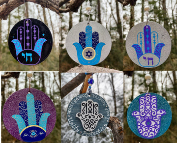 Hand painted wooden hamsa ornament with glitter evil eye and beads