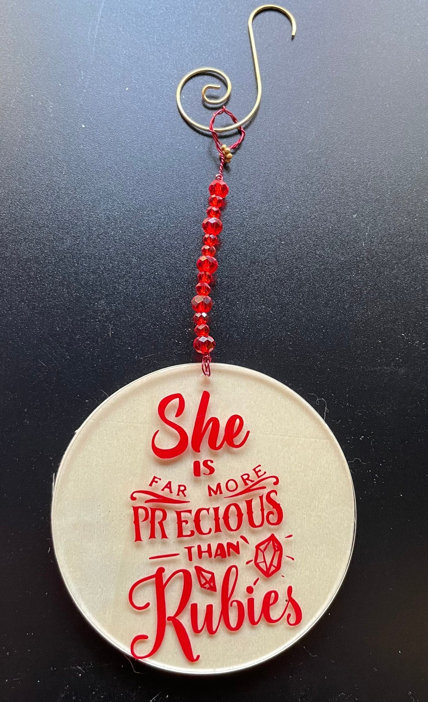 Feminist ornament reading Nevertheless She Persisted in painted wood | Judaica Square Lakewood (view 6)