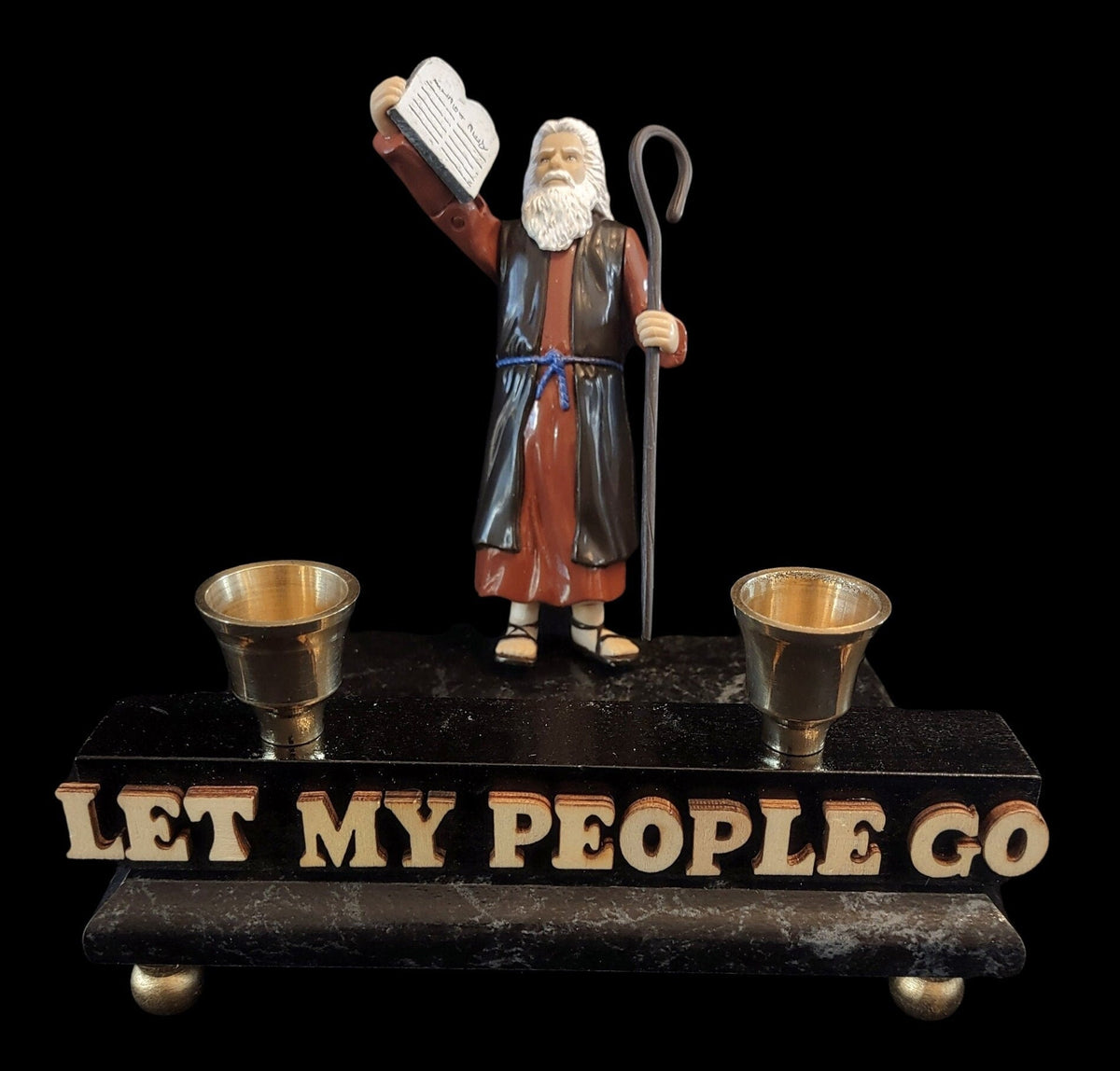 Moses Let My People Go Shabbat candlestick — action figure on marbleized wood base with brass cups | Judaica Square  (view 2)