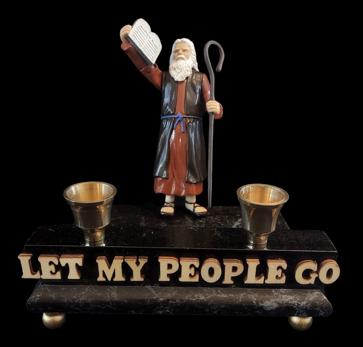 Moses Let My People Go Shabbat candlestick — action figure on marbleized wood base with brass cups | Judaica Square  (view 2)