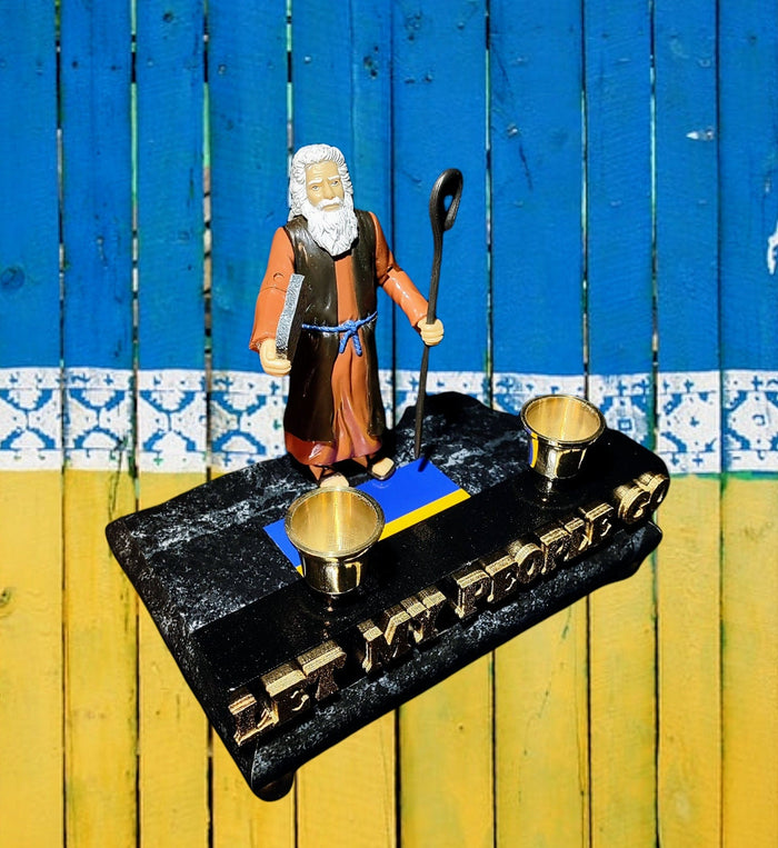 Moses Let My People Go Shabbat candlestick — action figure on marbleized wood base with brass cups | Judaica Square Lakewood