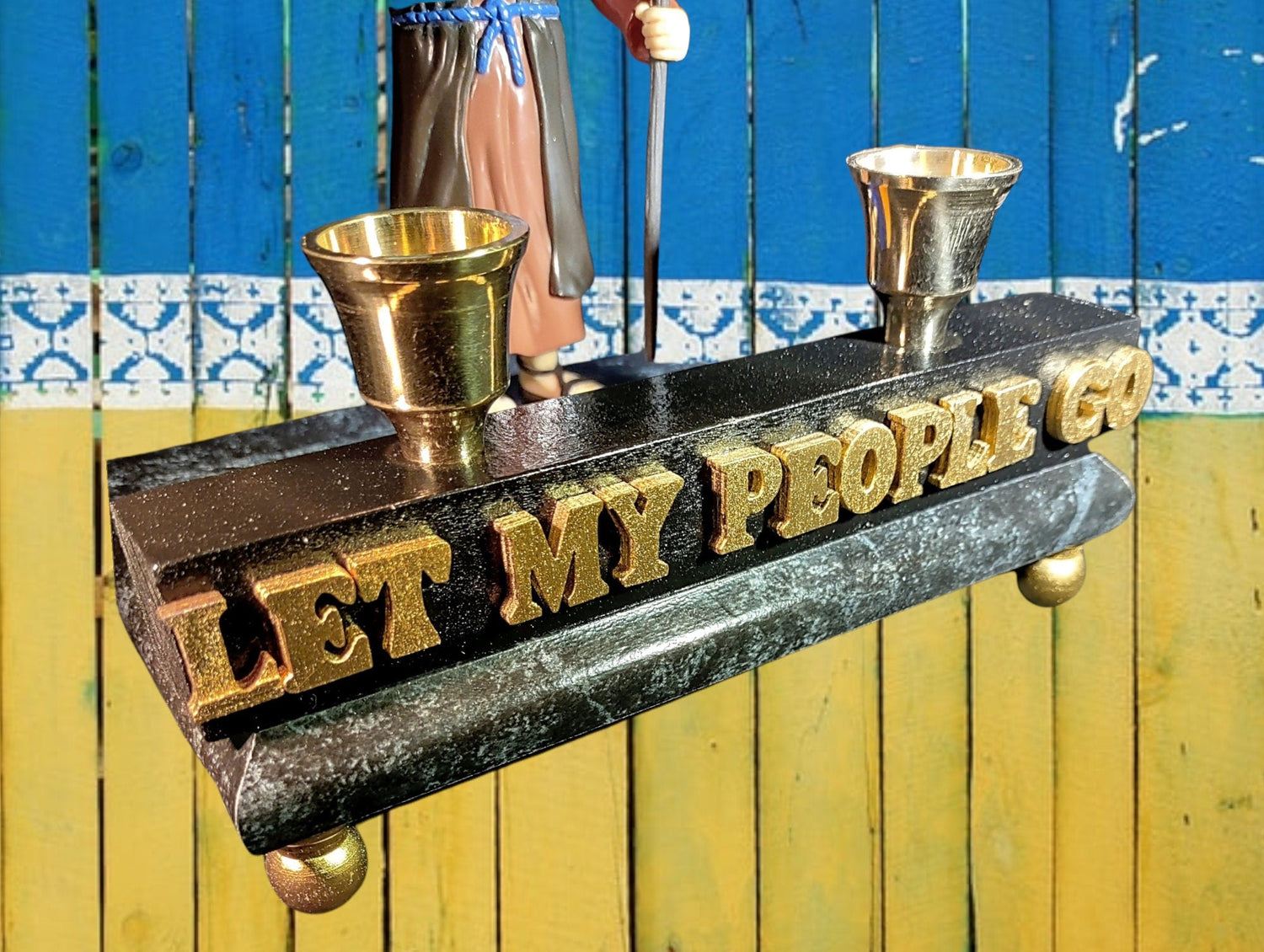 Moses Let My People Go Shabbat candlestick — action figure on marbleized wood base with brass cups | Judaica Square  (view 3)