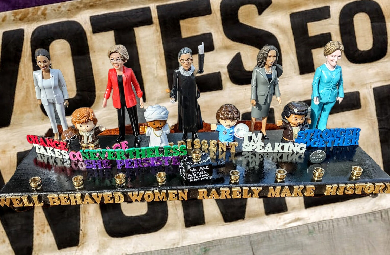 Feminist menorah — nine women figures with painted quote letters and brass cups | Judaica Square Lakewood (view 2)