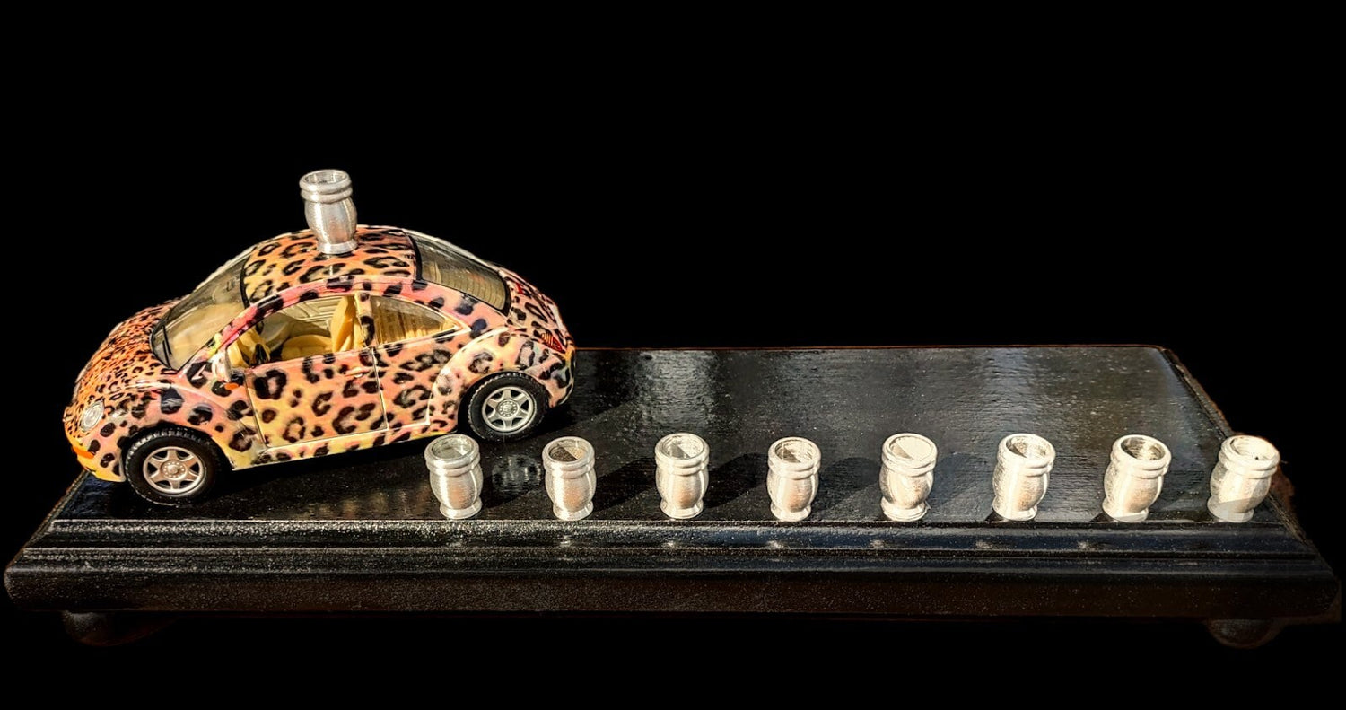 Punch-buggy menorah — leopard-print die-cast VW beetle on a painted wood base with candle cups | Judaica Square Lake (view 2)