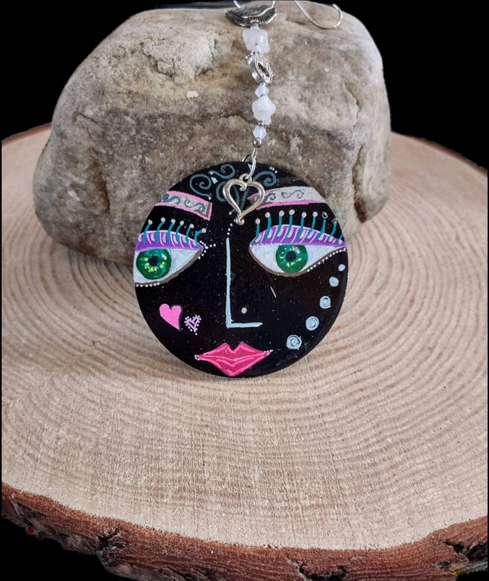 Hand painted wooden face ornament with lilies and hamsa evil eye | Judaica Square Lakewood