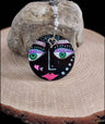 Hand painted wooden face ornament with lilies and hamsa evil eye | Judaica Square Lakewood
