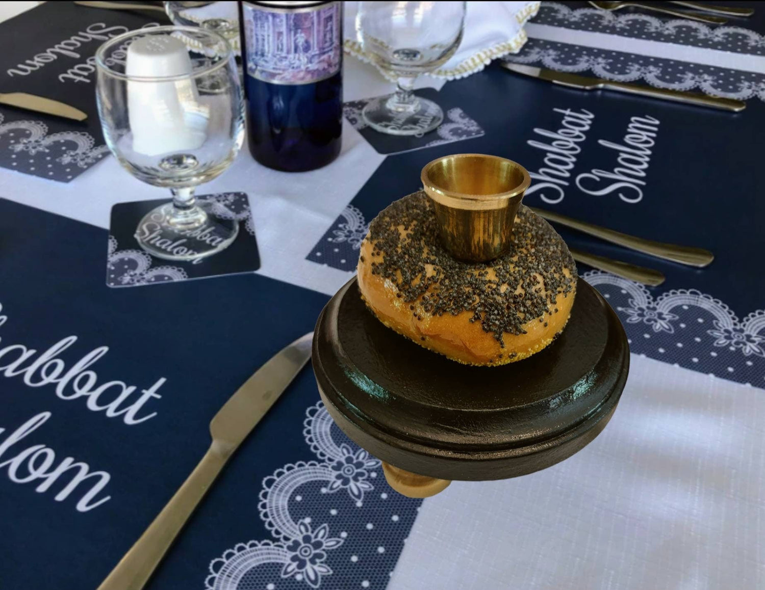 Bagel Shabbat candlesticks — shellacked real bagels on painted wood bases with brass candle cups | Judaica Square La (view 4)