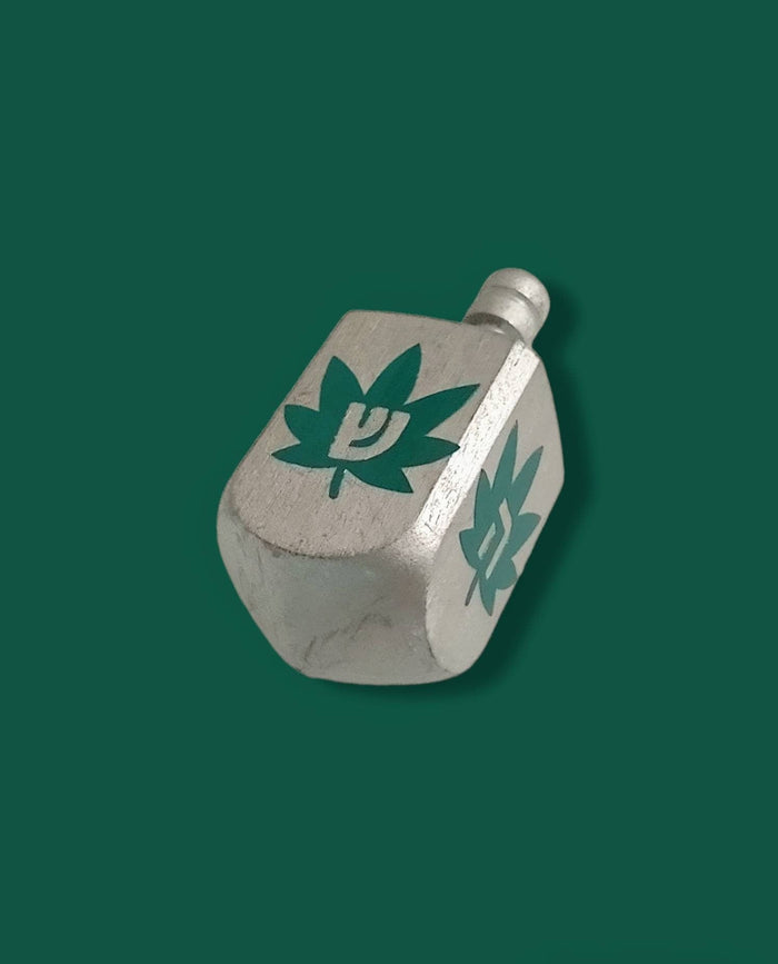 Cannabis dreidel — hand-painted wooden dreidel with green vinyl cannabis leaves | Judaica Square Lakewood